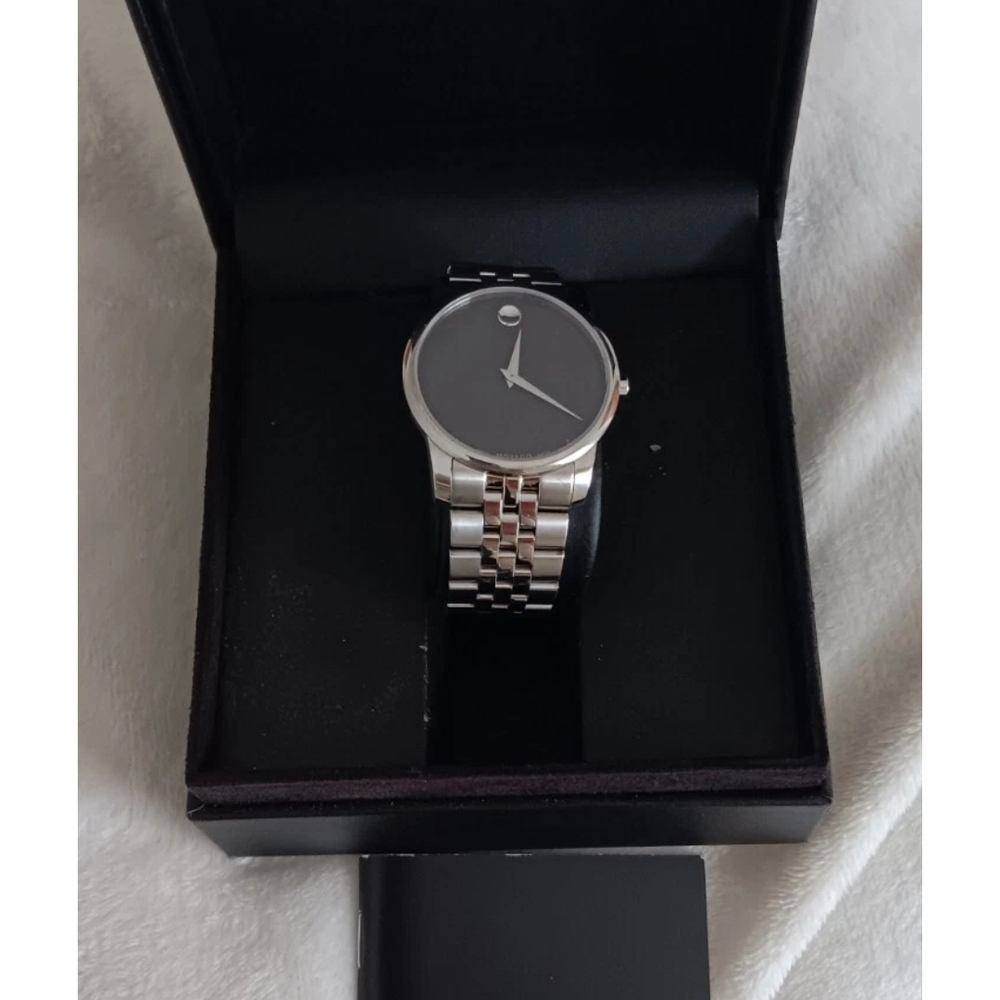 Movado Silver and Black Watch with Minimalist Design
